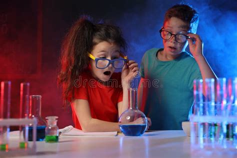 Children Doing Chemical Research Dangerous Experiment Stock Image