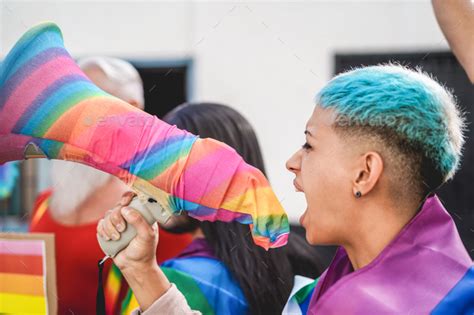 lesbian demonstrator screaming at lgbt pride protest for equality rights main focus on