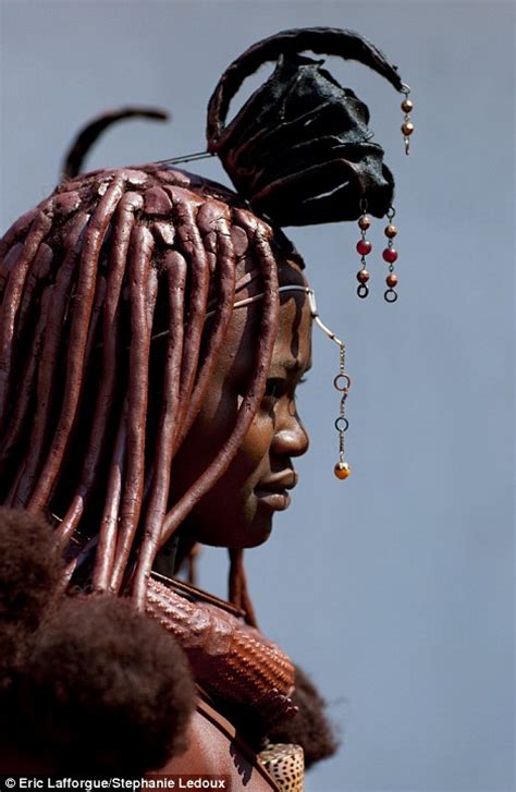 incredible photos reveal the elaborate hairdos of the himba tribe created using goat hair and