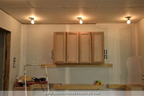 Wall cabinets are generally very heavy and, additionally, they often support a lot of weight. Wall Of Cabinets Installed (Plus, How To Install Upper ...