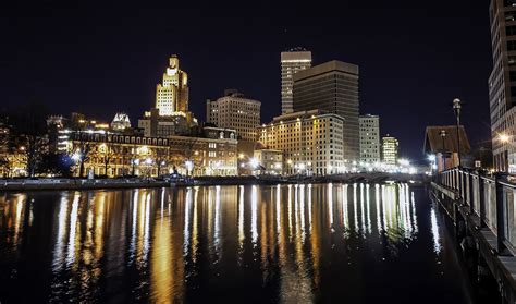 Skyline Of Providence Rhode Island At Nighttime Over The Water Image