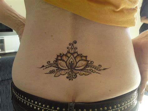 Beautiful Lotus Flower Henna On Lower Back Henna