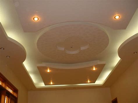 Then insert the stretch ceiling materials with pvc harpoon into the gap of installed frames ( profiles),which can be fit into any shapes and meet any designs. Pop Ceiling Design For Hall With 2 Fans - Wallpaperall ...