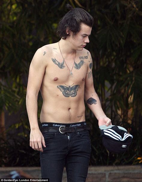 harry styles reveals his bare bottom as he urinates in a bush in leaked photo daily mail online
