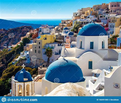 Iconic Photo Of Blue Domed Churches And Buildings Of Santorini Stock