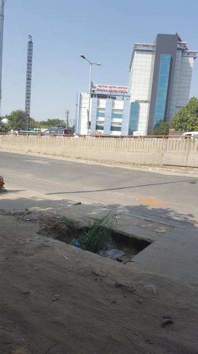 Gaping Holes In Dwarka Pavement Times Of India
