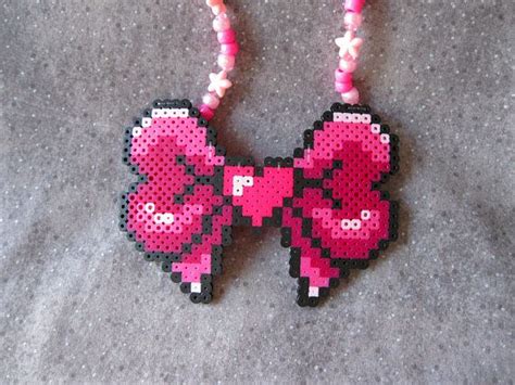 This Heart Bow Kandi Necklace Gives Off Exactly The Kind Of Vibes I