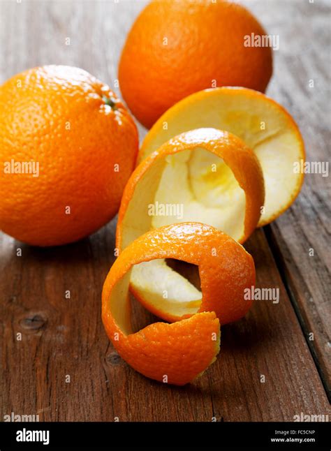Oranges And Dried Peel On A Rural Table Stock Photo Alamy