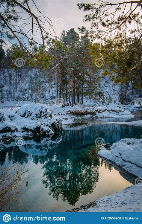 Winter Landscape Small Turquoise Lake In The Mountains Among Snow