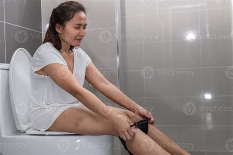 Have Problems With Excretion Concept An Asian Woman Sits On The Toilet Bowl Constipation And A