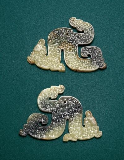 A Pair Of Jade Dragon Form Pendants Early Warring States Period