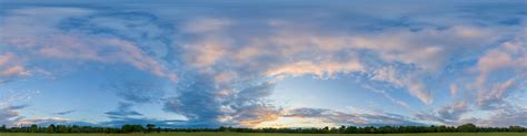 Panorama of the setting sun with a set of clouds. 360 HDRI panorama of Golden Sunset in high 30k, 15k or 4k resolution