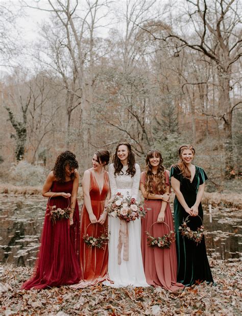 you ve got to see the bridesmaids in jewel tones floral hoops in this luxe autumn wedding