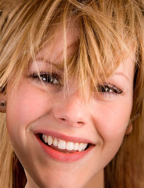 Young Blonde Girl With Messy Hair — Stock Photo © Cybernesco 2393917