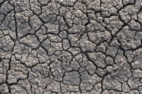 Close Up Detail Of Cracked Soil Caused By Very Dry Weather Drought