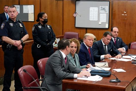 trump pleads not guilty meet trump s legal team