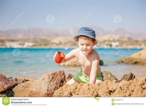Little Boy Play With Sand On Summer Beach Stock Image Image Of