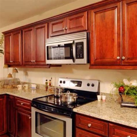 Although cabinet refacing is generally less expensive than springing for entirely new cabinetry, the costs associated. Our kitchen and bathroom cabinets! Walnut Merlot ...