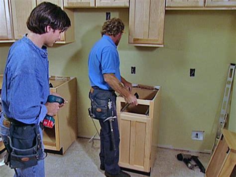 Given that the typical baseboard unit is ~ 2 deep, how about spacing the bookshelf assembly off the wall my kitchen cabinets are built over baseboard heat in this matter, and the room has functioned perfectly. How to Replace Kitchen Cabinets | how-tos | DIY