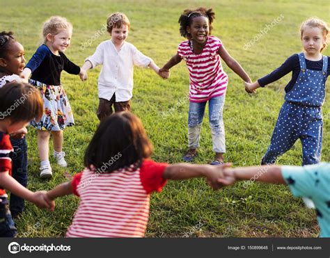 Little kids having fun at park — Stock Photo © Rawpixel  
