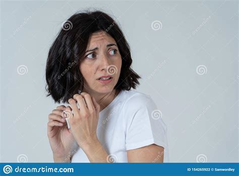 Portrait Of A Young Attractive Woman Looking Scared And Shockedhuman