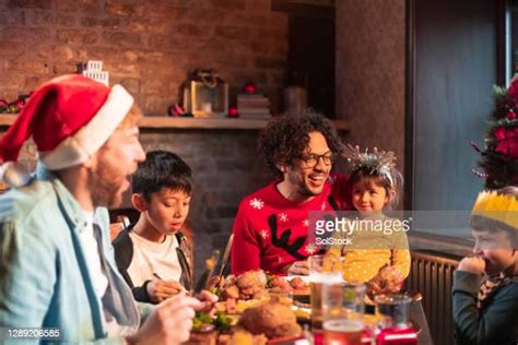 Multicultural Christmas Photos And Premium High Res Pictures Getty Images
