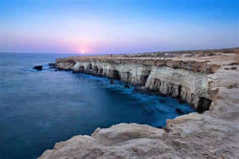 Cliff With Sea Caves On Cape Greco Ayia Napa Cyprus Stock Photo