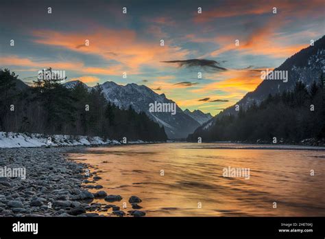 Wild Alpine River Lech At Sunset Between Alpine Mountains Stock Photo