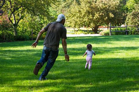 Daddy Chasing After Little Girl Stock Images Image 30585214