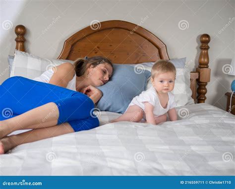 Tired Mother With Baby Sleeping Mum Stock Image Image Of Pillow