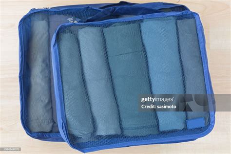 Cube Meshed Bags With Rolled Clothes Set Of Travel Organizer To Help