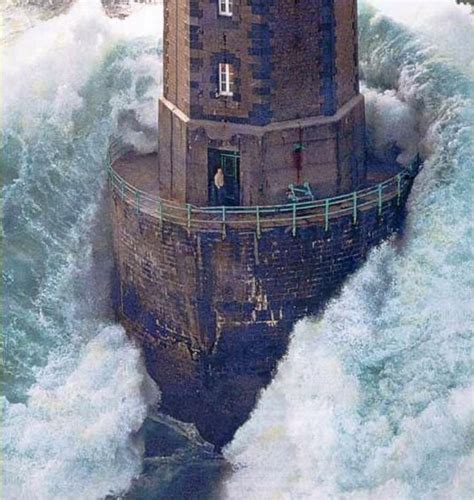A Massive Wave Hits A Lighthouse Off The Coast Of France Rpics