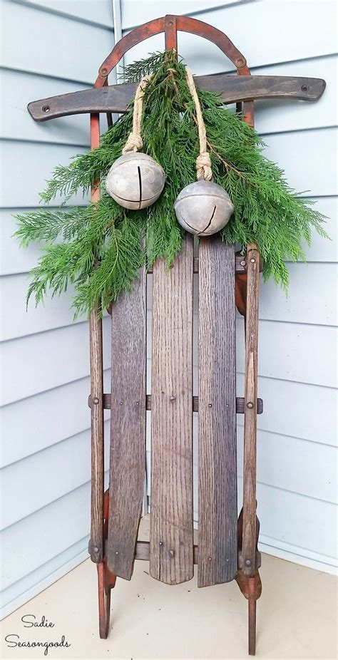 Wooden Sled Decor With Sweater Mittens For The Front Porch