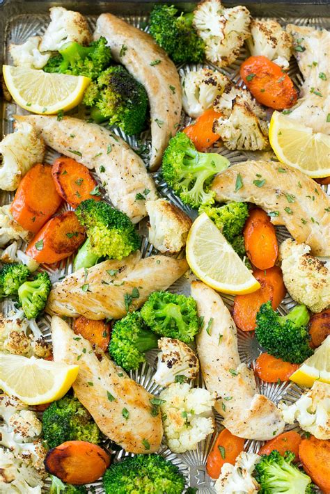 This sheet pan dinner is such an easy chicken breast recipe! Sheet Pan Chicken And Veggies Recipe - Healthy Fitness Meals
