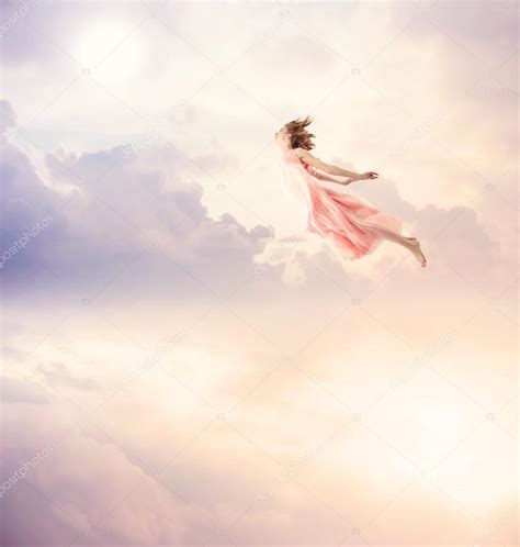 Girl In A Pink Dress Flying In The Sky — Stock Photo © Melpomene 56597113