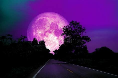 Full Pink Moon On Night Sky Over Country Road Stock Image Image Of