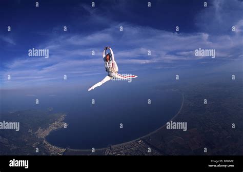 Female Freestyle Skydiver Performs A Beautiful Pose Above The Spanish