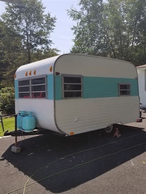 In a moment you will receive an email confirming your registration. restored 1965 Tag-A-Long taga camper trailer for sale