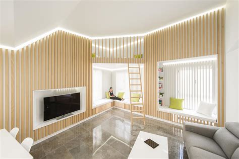 Wood Slats On The Walls Give This Homes Interior A Distinct Look