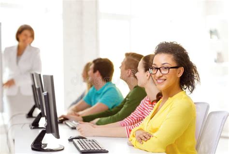 Female Student With Classmates In Computer Class Stock Photo Image Of