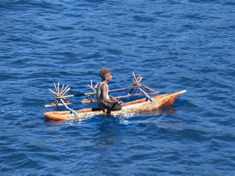 Outrigger Canoe An Outrigger Canoe Patrols Off Waisisi Vil Flickr