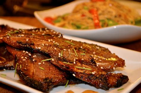 Combine soy sauce, sugar, green onions, sesame seeds, sesame oil, and ko chu jang with ribs and marinate for 30 minutes to 1 hour. One Classy Dish: Korean BBQ Short Ribs (Kalbi)