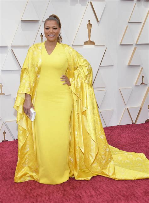 Queen Latifah Glows In Elegant Yellow Halter Dress And Sparkling Shawl At