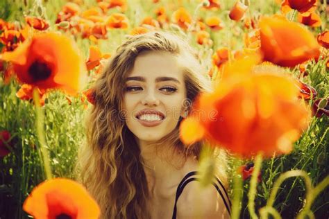 beautiful woman on poppy field with long hair stock image image of maquis meadow 132934499