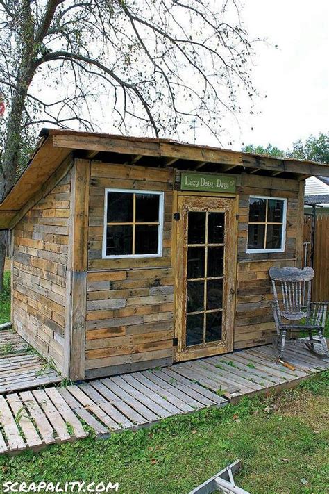 How To Build A Shed Using Pallets Old Windows And Tin Cans Pallet Shed