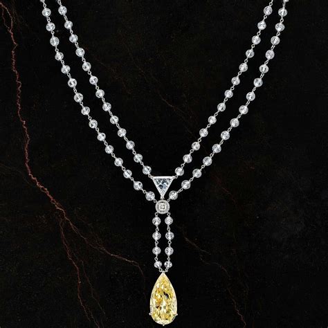 Chatilajewels A Gorgeous Yellow Diamond Is Suspended From White