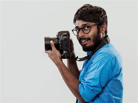 Professional Photographer Having Dslr Camera Taking Pictureindian Man