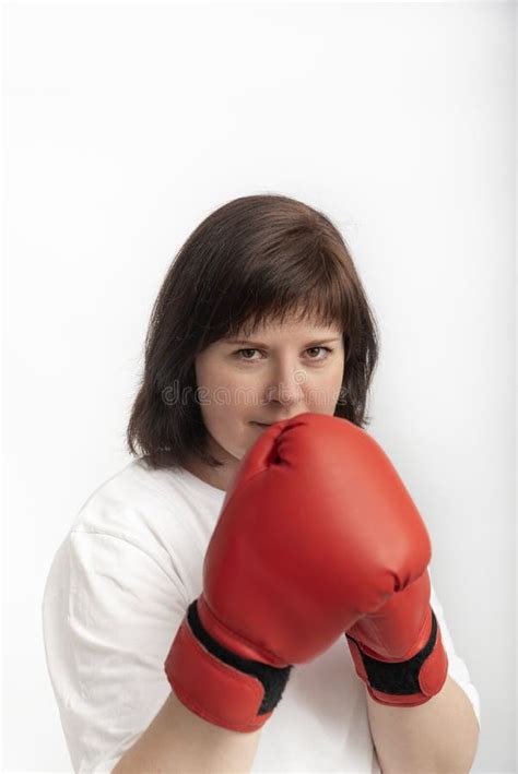 Portrait Of Young Caucasian Woman In Boxing Gloves On White Background