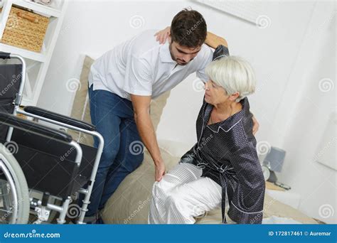 Home Caregiver Helping Senior Woman Getting Up Stock Image Image Of Pajama Beatiful 172817461
