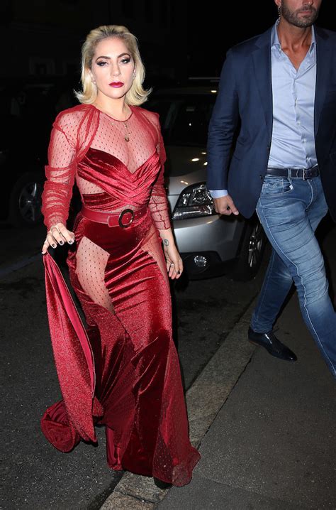 Lady Gaga Chooses Daring Sheer Red Dress In Milan Photos The Daily
